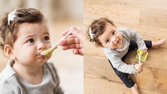 Baby Girl eating pureed baby food from a spoon