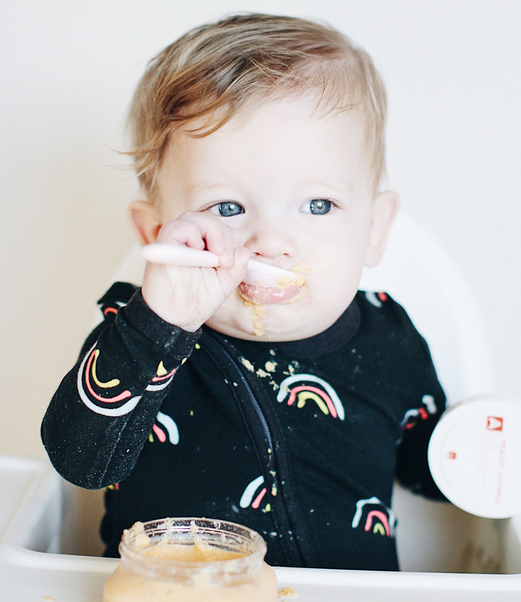 Baby eating from a spoon - Square Baby