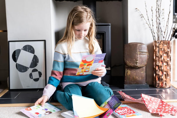 Child opening Christmas gift