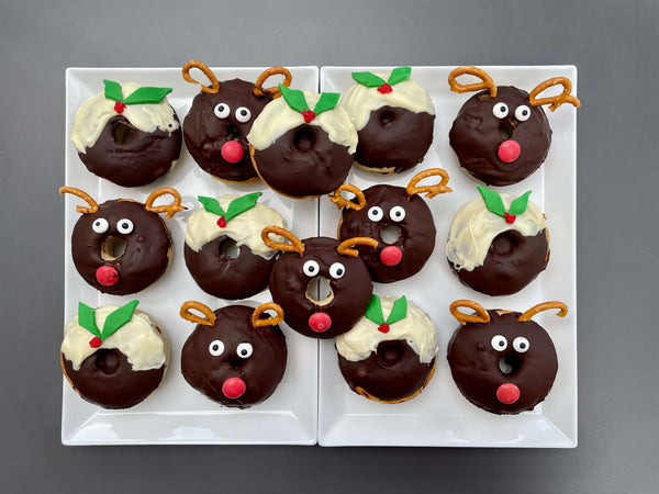 Christmas doughnuts shaped like Christmas puddings and Reindeer
