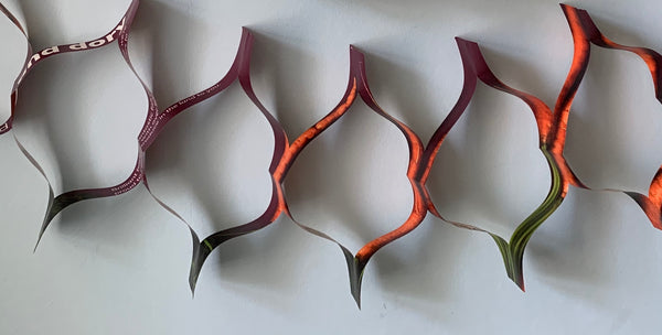 Fold and snip recycled paper garland