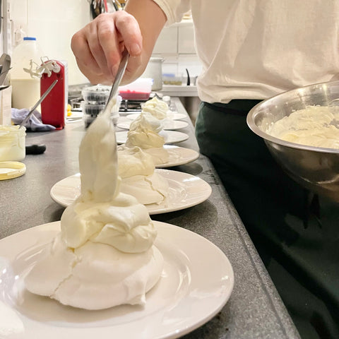 Plating up dessert at a Salt the Radish private dinner.