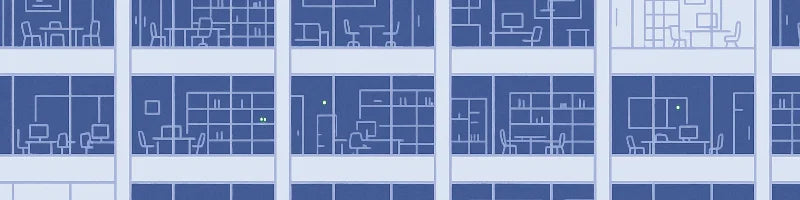 A view of offices in a large building.