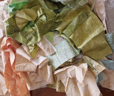scraps of fabric in green and tan