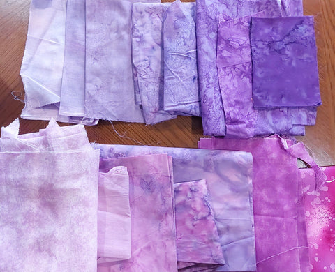 selecting pink and purple fabrics for hollyhock block pattern