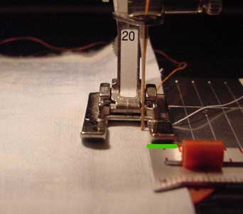 adjust needle position to make a quarter inch seam