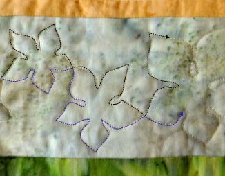 quilting one side of leaves in a continuous line