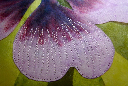 adding light pink thread to outer edge of petal using free motion stitching