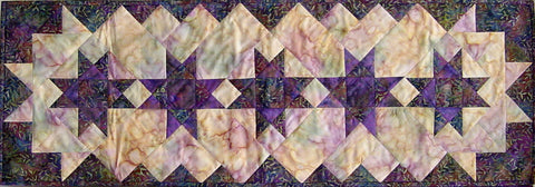 table runner quilt pattern with stars and colored border