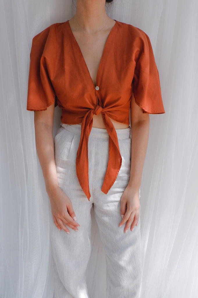 burnt orange satin top