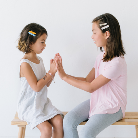 girls wearing Audrey & bear clips