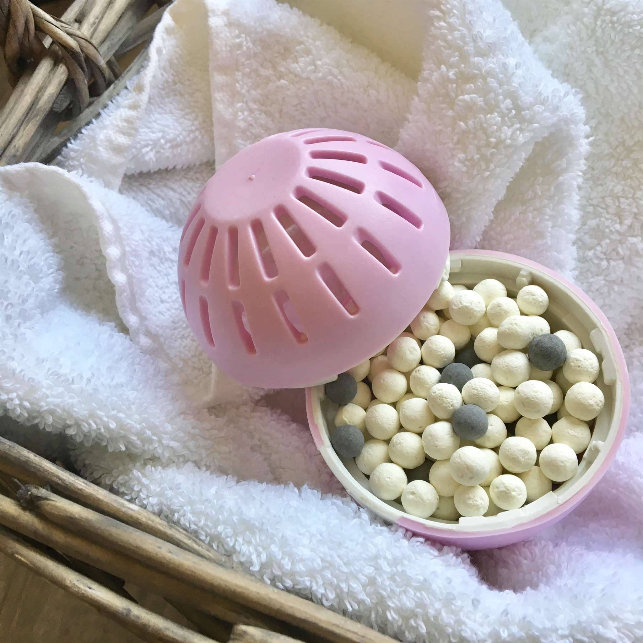 Pink Eco Egg Open on Laundry