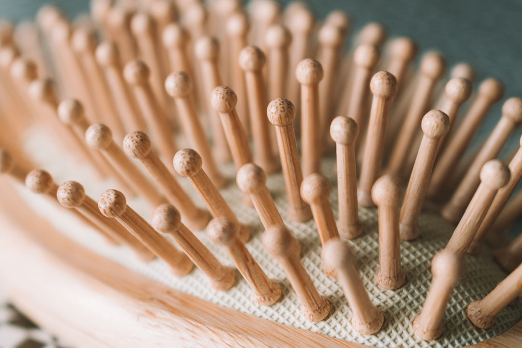Wooden bristles run smoother through knots and tangles in hair