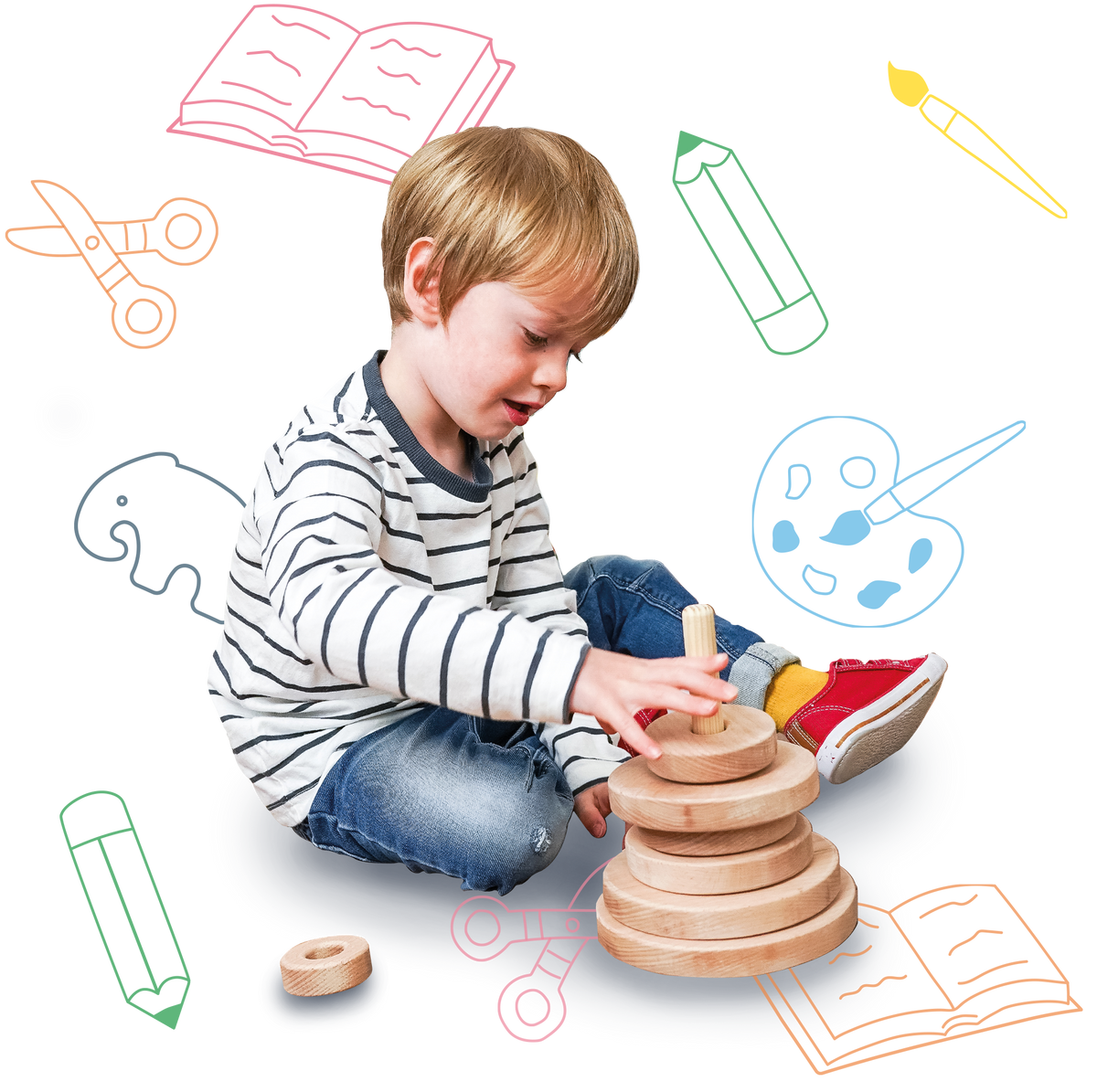 Boy playing with stacker toy