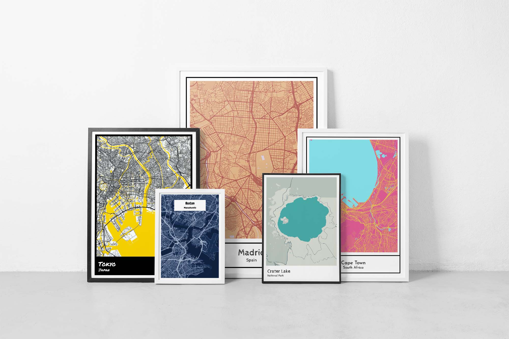 Collection of framed map art prints on a wall to show different size options.