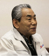 Iwao Hayakawa, president of the Board