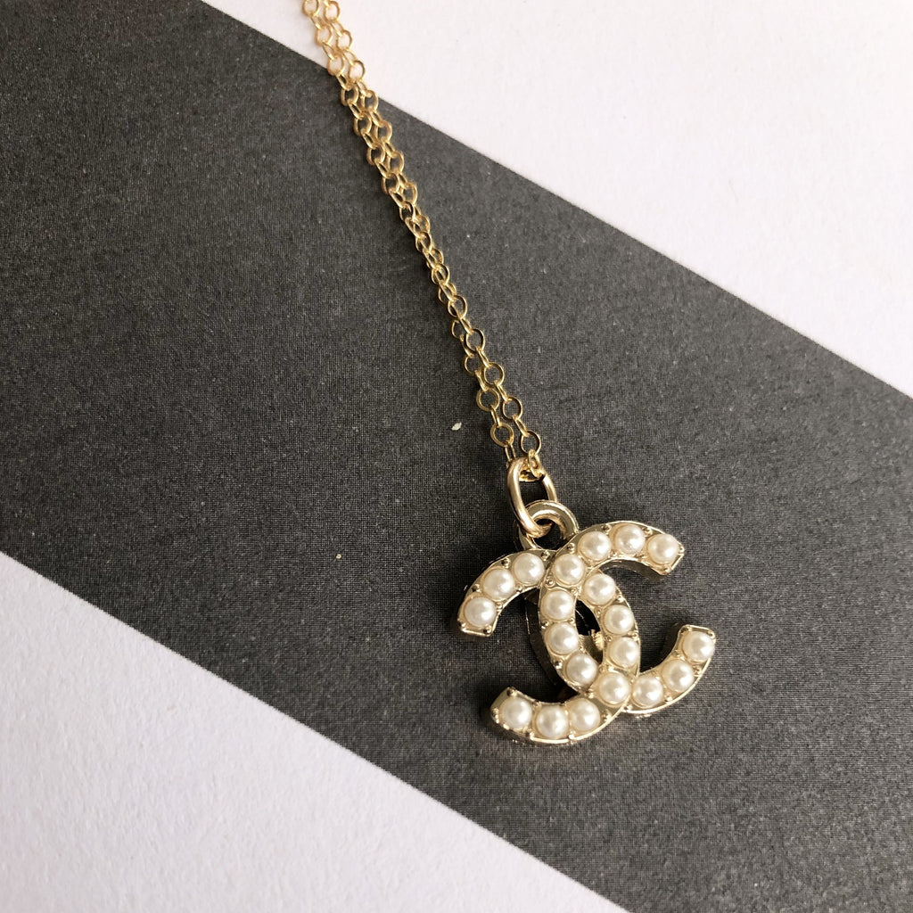 Small and Simple Circle CC Gold Cut Out Chanel Logo Necklace – Vintage  Vogue Lux