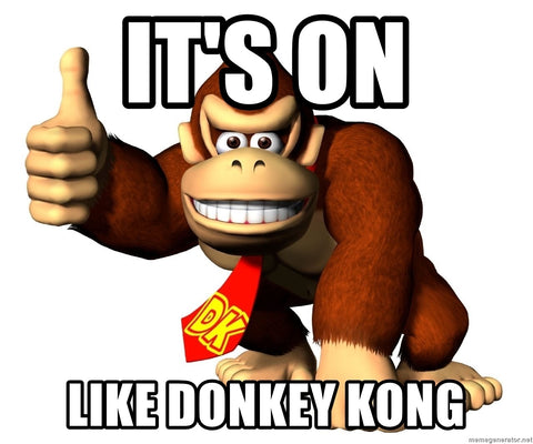 Donkey Kong wearing a tie, giving a thumbs up with the quote " It's on like Donkey Kong"