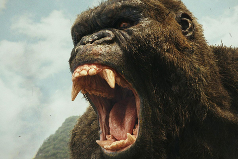 King Kong with his mouth open, baring his teeth.