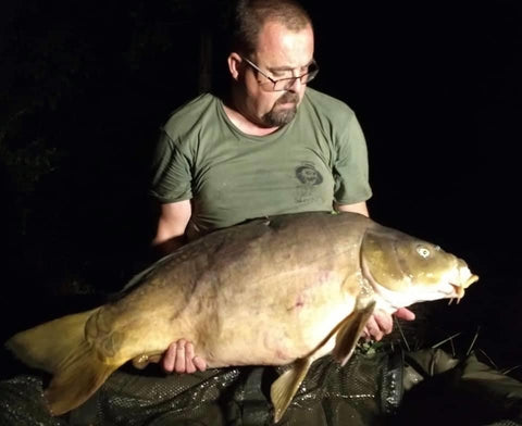 James catching carp in France
