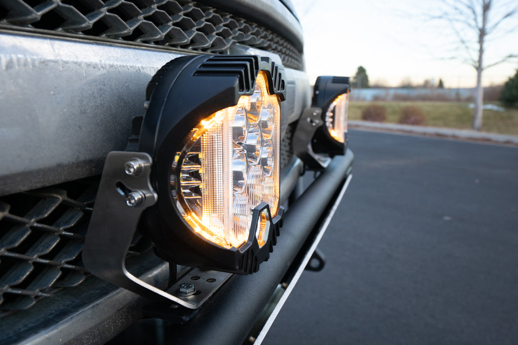 Juggernaut USA's Silverado 1500 Prerunner Bumper with LED Lights and Skid Plate for Off-Road Excellence.