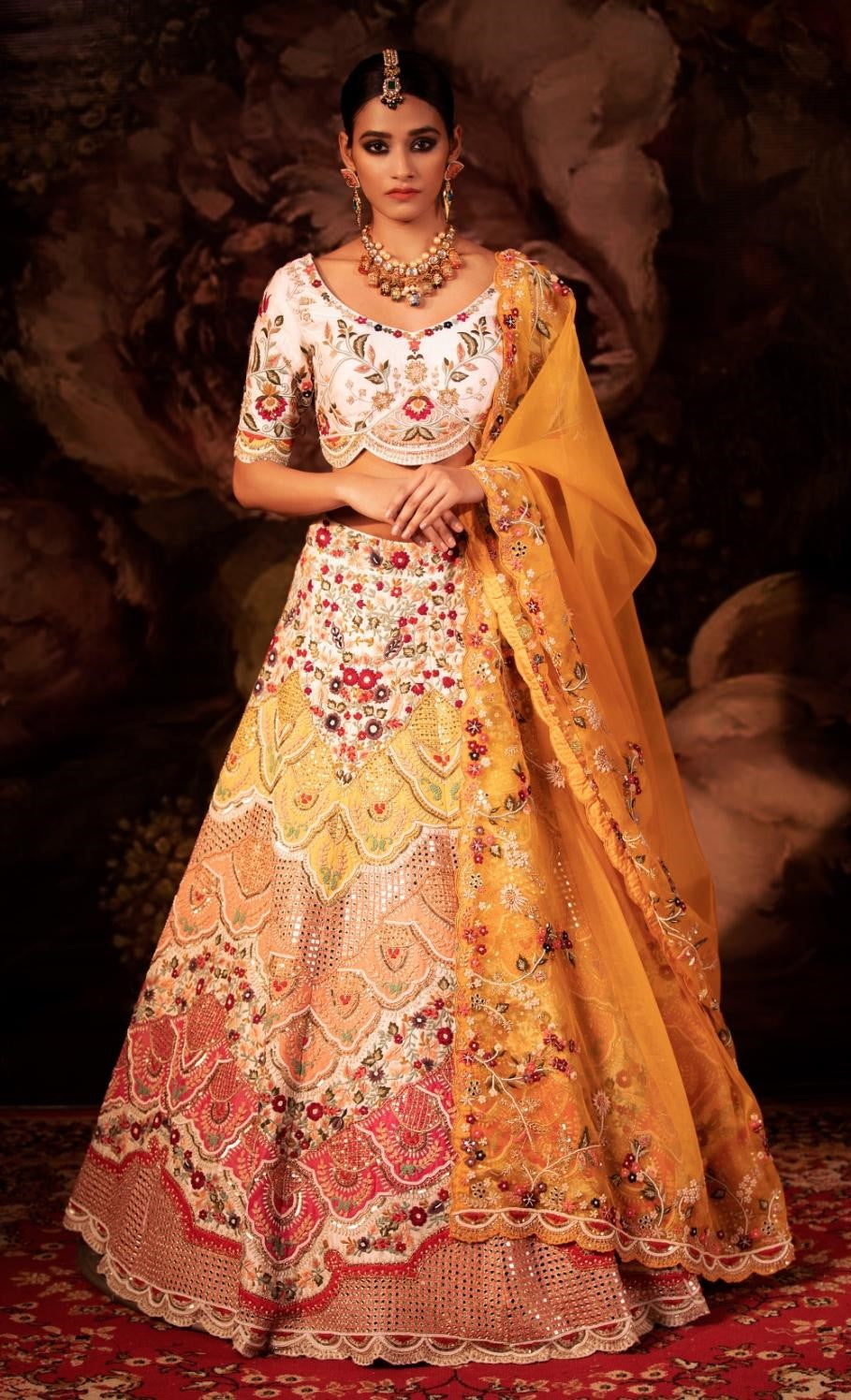 What colour lehengas would look good on a slight dark complexion bride for  an evening reception? - Quora