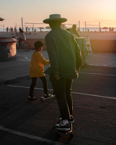 Skateboard Guy with his Son.