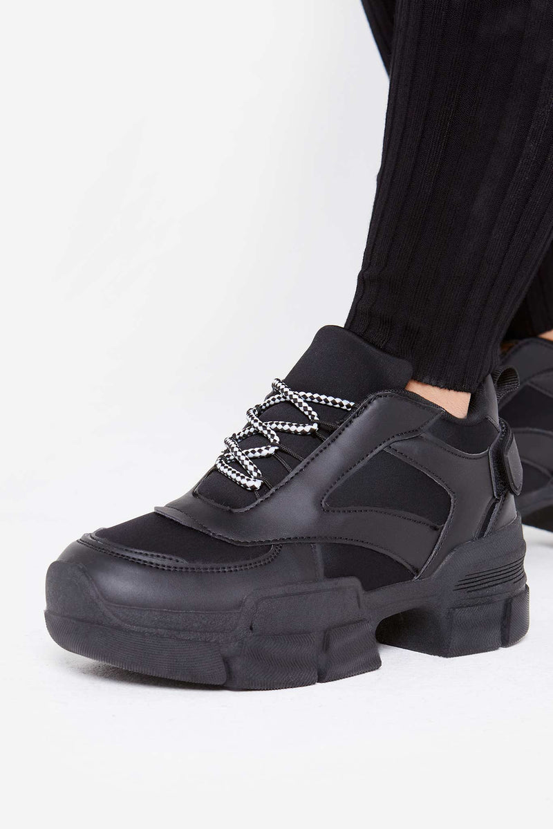 all black chunky trainers