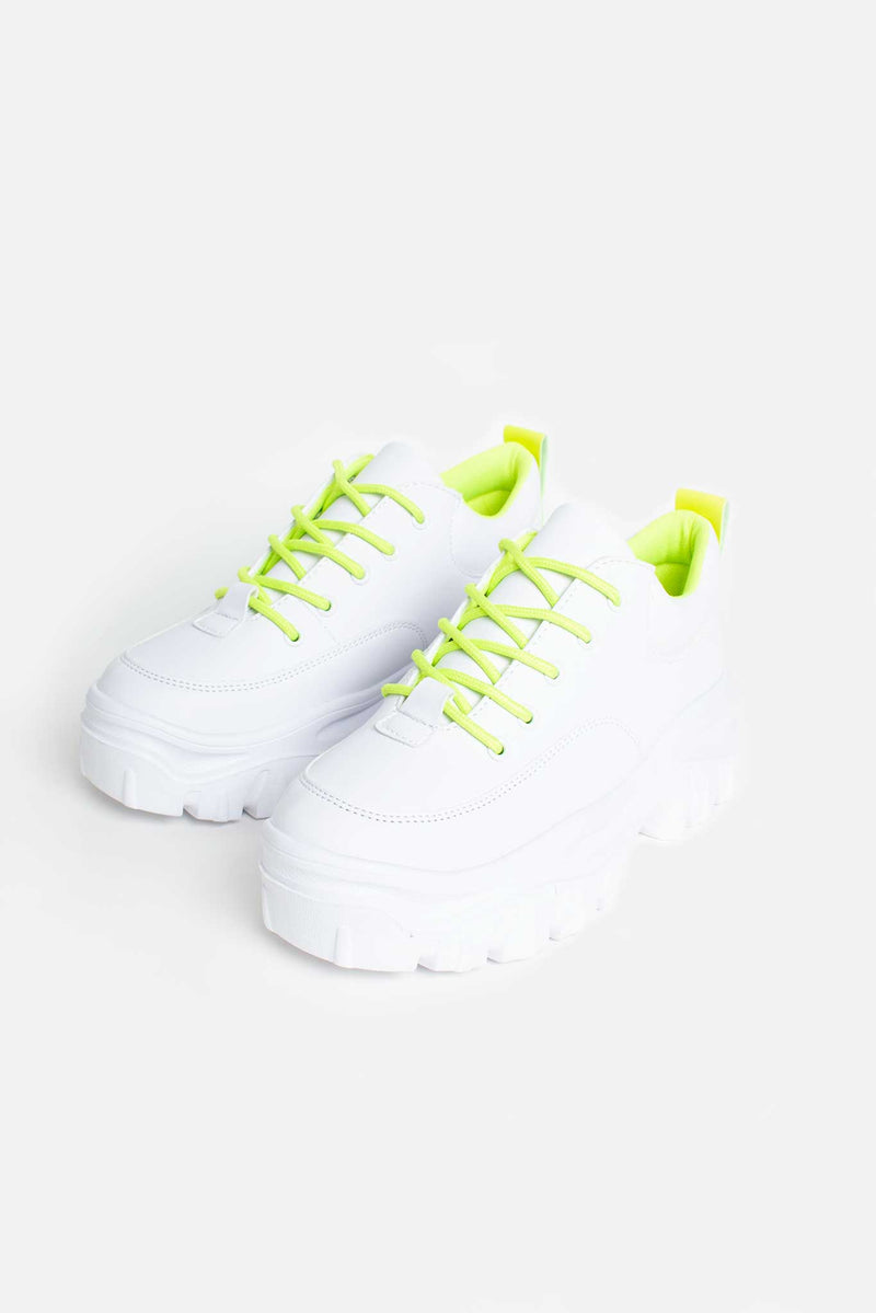 white and neon trainers