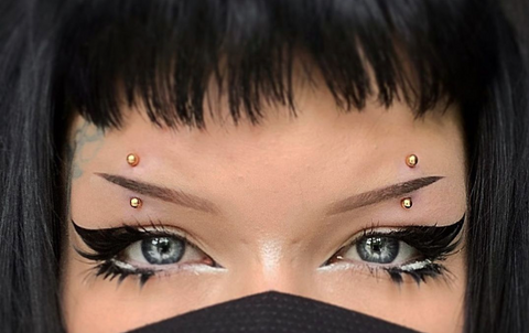 alternative goth facial piercings