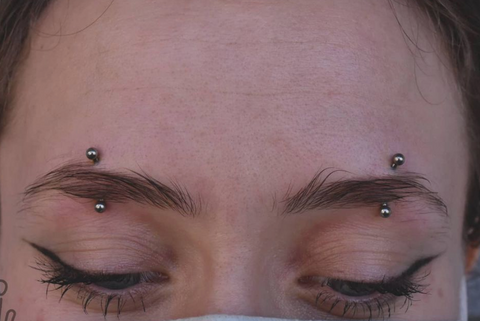 middle eyebrow piercing by @tyler.the.piercer