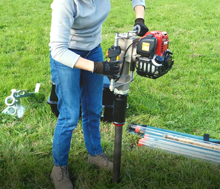 Easy petrol post driver with steel sampling tube