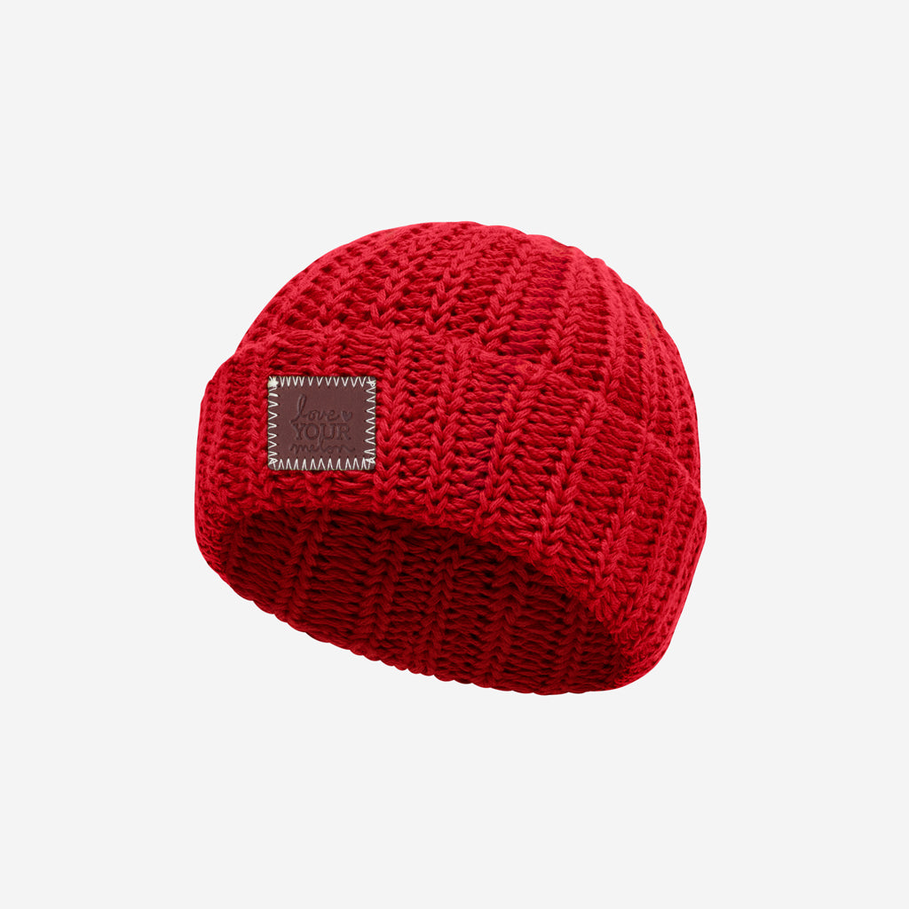 baby in red beanie