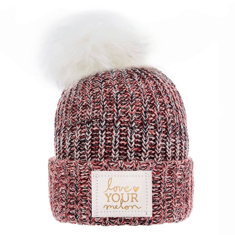 white beanie with pom pom