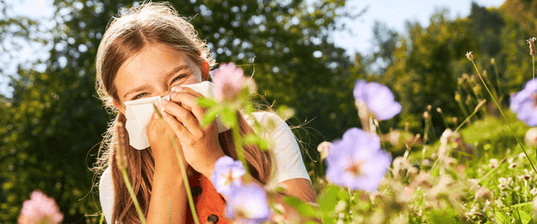 A girl in a field of flowers for Nature's Supplements 