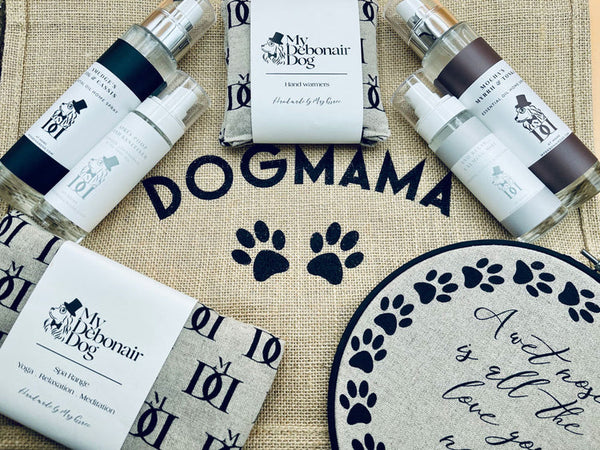 A range of My Debonair Dog products; room sprays, personalised bags, signs and hand warmer 