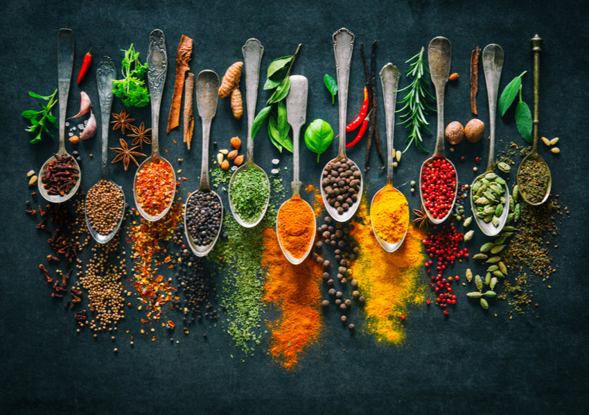 Assortment of herbs and spices on spoons