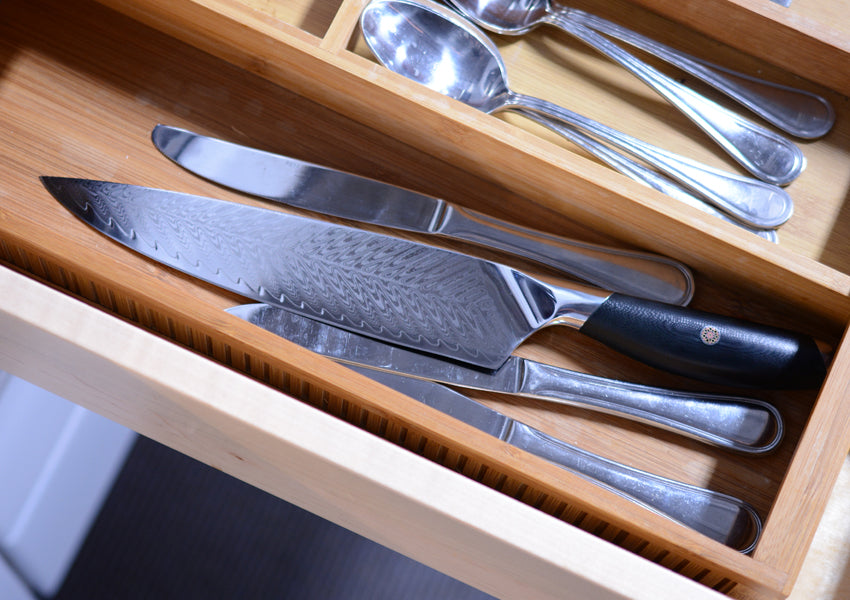 I install a 'The Drop Block' under cabinet knife storage 