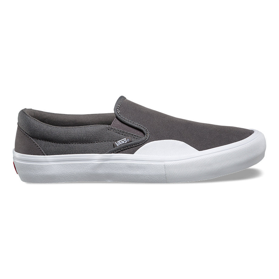 gray and white slip on vans