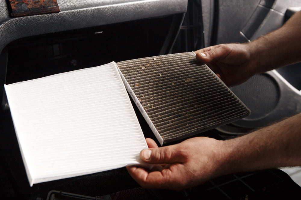 A person holding Cabin air filters