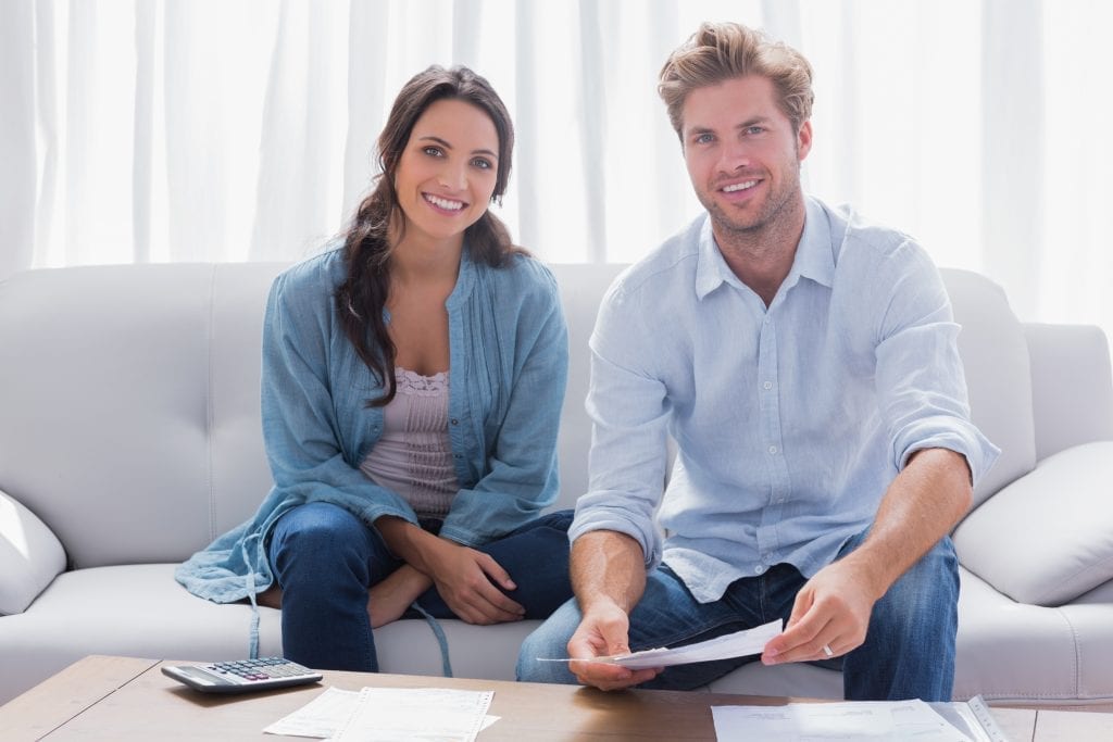 man and woman discussing finances