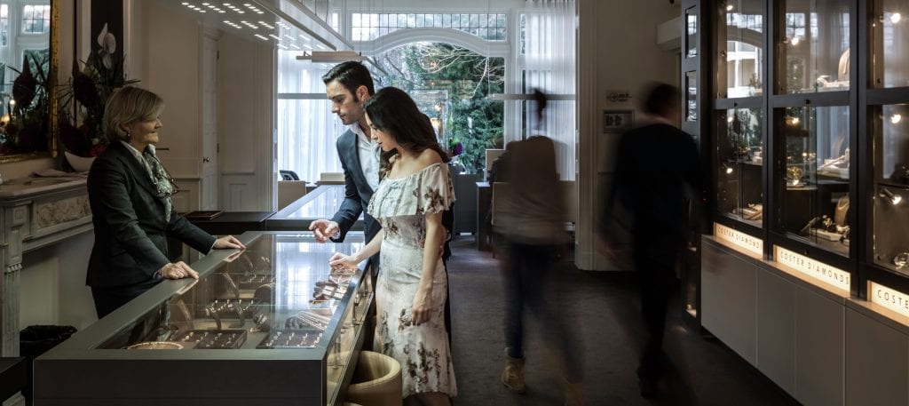 man and woman visiting royal coster diamonds