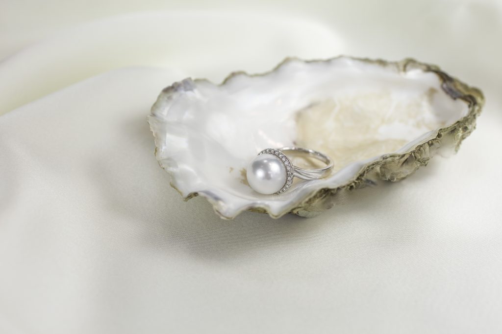 pearl ring in oyster