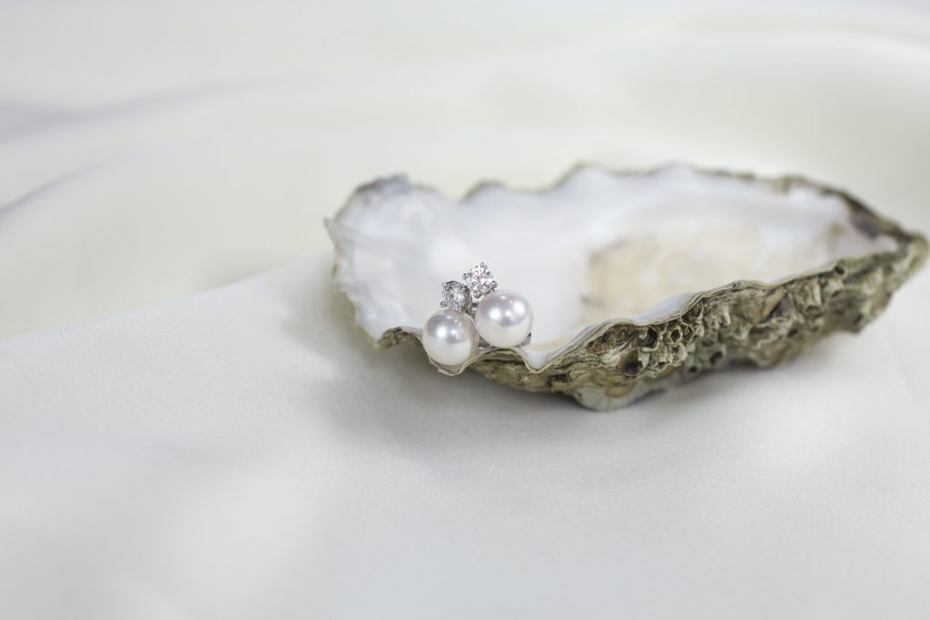 pearl earrings in oyster