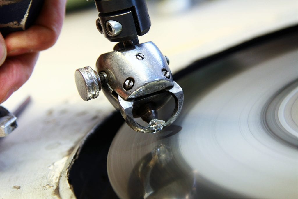 polisher finishing a diamond 