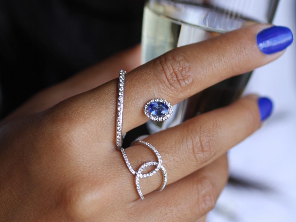 woman wearing sapphire ring from royal coster
