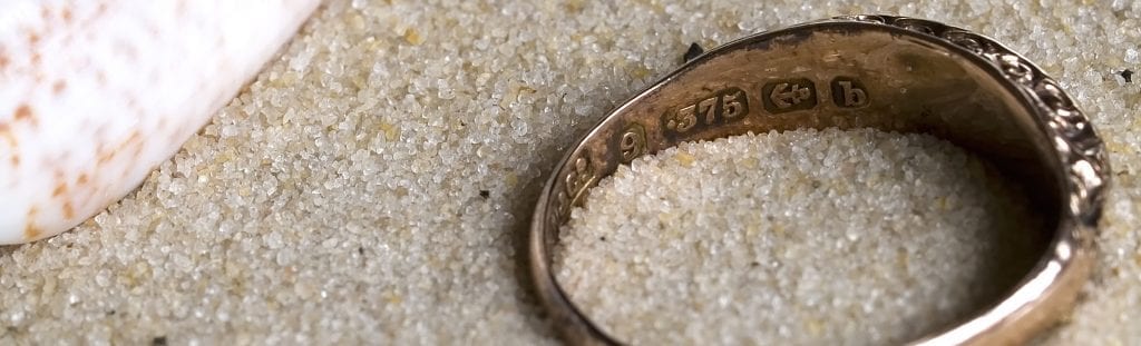 Gold ring with hallmark inside as a proof of real gold and diamonds