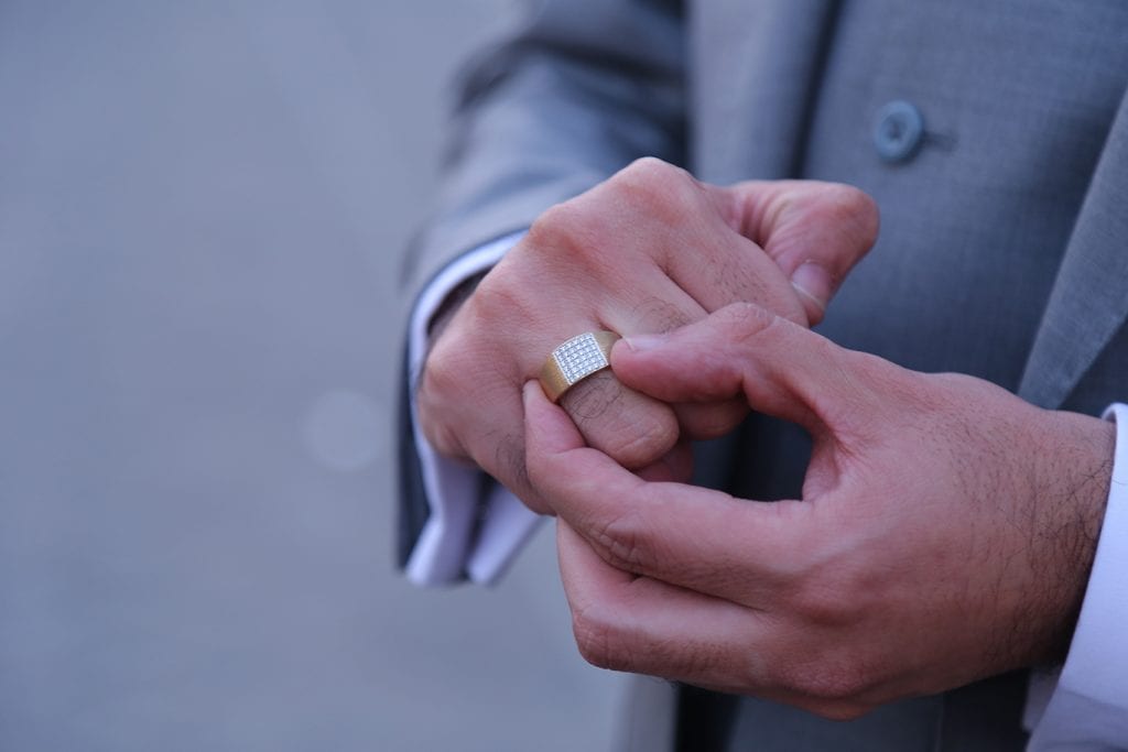 man wearing a diamond ring