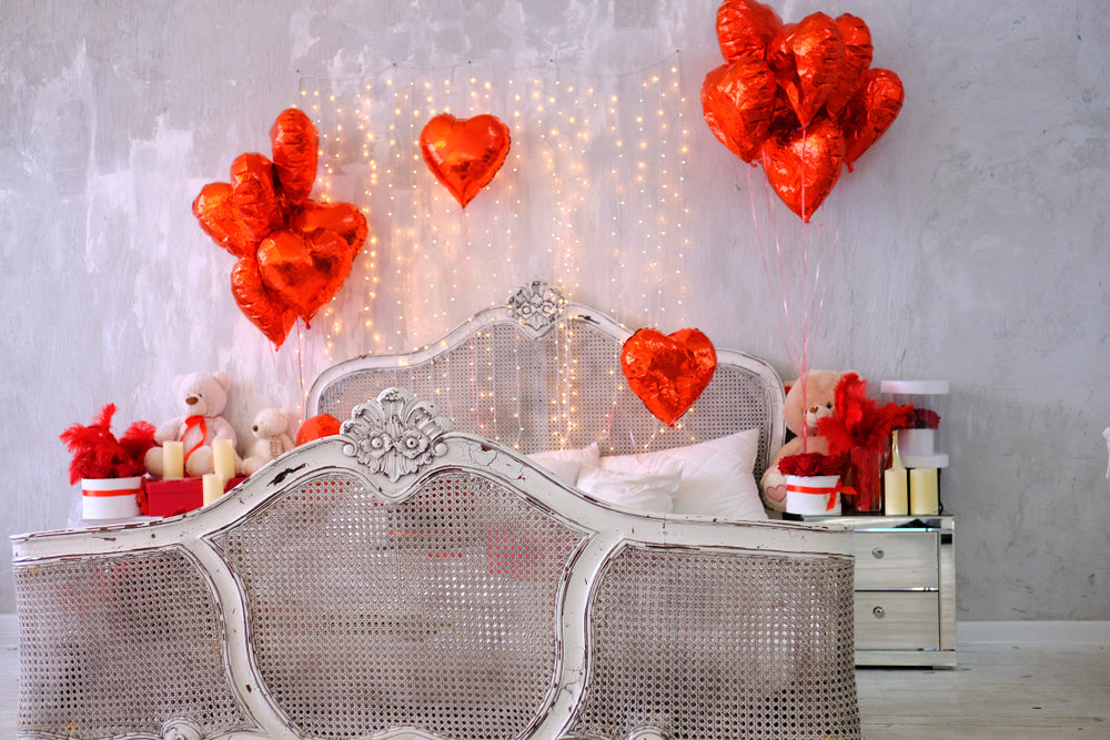 bedroom romantic setting with balloons 