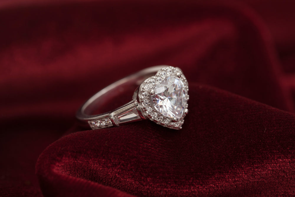 heart shaped diamond ring with halo and side stones